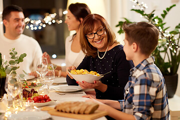 Image showing happy family having dinner party at home