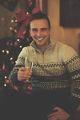 Image showing young man with champagne glass  on party