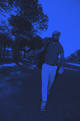 Image showing golf player walking