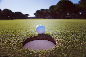 Image showing golf ball in the hole