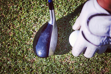 Image showing golf club and ball in grass