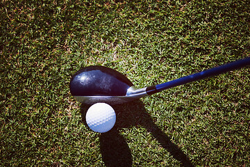 Image showing top view of golf club and ball in grass