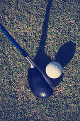 Image showing top view of golf club and ball in grass