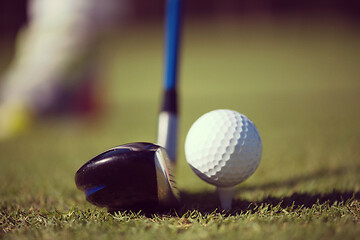 Image showing golf club and ball in grass