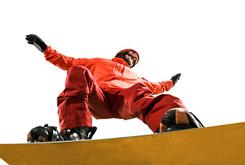 Image showing Portrait of young man in sportswear with snowboard isolated on a white background.