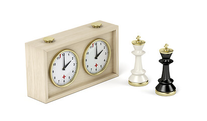 Image showing Chess king pieces and analog chess clock