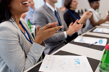 Image showing happy people applauding at business conference