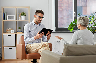 Image showing psychologist with tablet pc and senior patient