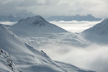 Image showing Snowy skiing slopes from the top