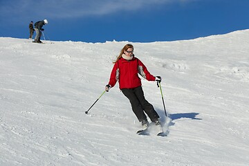 Image showing Skiing in the winter snowy slopes