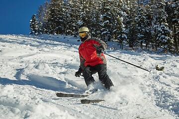 Image showing Skiing in the winter snowy slopes