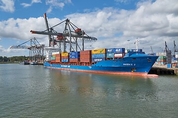 Image showing Loading containers on a ship