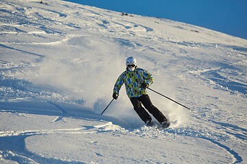 Image showing Skiing in fresh powder snow