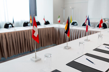 Image showing table in boardroom at international conference