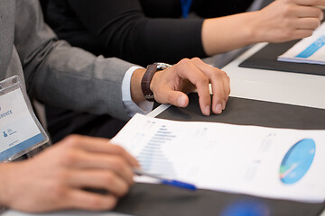 Image showing hands of businessman at business conference