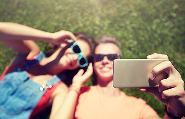 Image showing happy couple taking selfie on smartphone at summer