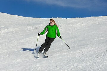 Image showing Skiing in the winter snowy slopes