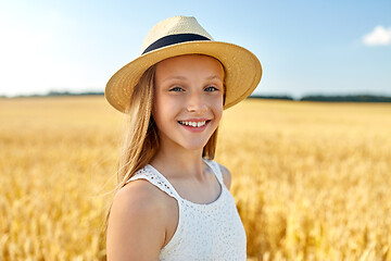 Image showing portrait of girl in straw hat on field in summer