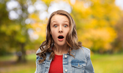 Image showing surprised or shocked teenage girl in autumn park
