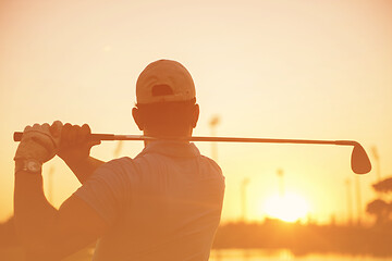 Image showing golfer hitting long shot