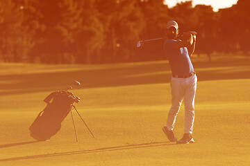 Image showing golf player hitting long shot