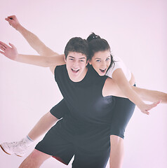 Image showing happy young couple fitness workout and fun