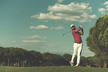 Image showing golf player hitting long shot