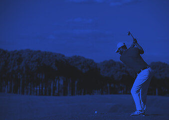 Image showing golf player hitting long shot