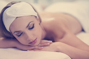 Image showing woman getting back massage in spa salon