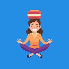 Image showing Business woman meditating in lotus position.