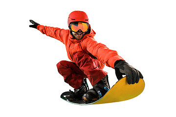 Image showing Portrait of young man in sportswear with snowboard isolated on a white background.