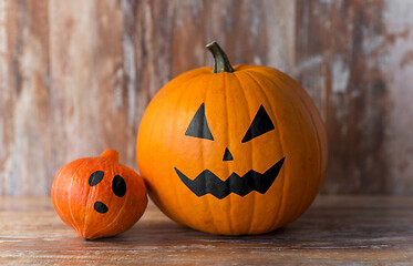 Image showing halloween pumpkin and squash on wooden background