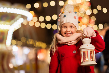 Image showing happy little girl at christmas with lantern market