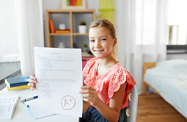 Image showing student girl with school test good mark at home