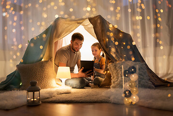 Image showing family with tablet pc in kids tent at home