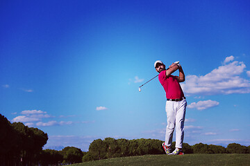 Image showing golf player hitting long shot