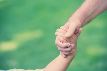 Image showing grandfather and child have fun  in park