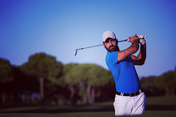 Image showing pro golfer hitting a sand bunker shot