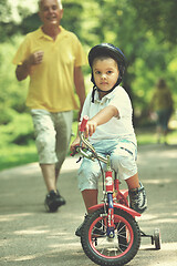 Image showing happy grandfather and child in park