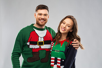 Image showing happy couple at christmas ugly sweater party