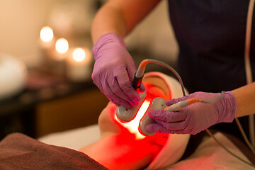 Image showing young woman having face microdermabrasion at spa