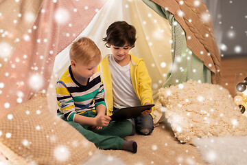 Image showing little boys with tablet pc in kids tent at home