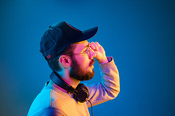 Image showing Enjoying his favorite music.