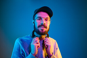 Image showing Enjoying his favorite music.