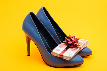 Image showing Birthday girl gift blue high-heeled shoes and a pack of five-thousandth bills