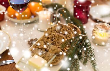 Image showing bread slices and other food on christmas table