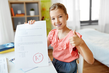 Image showing student girl with school test good mark at home