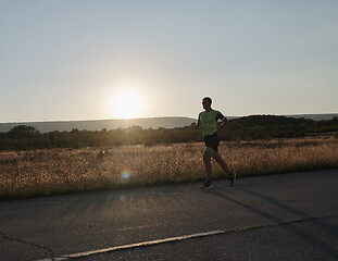 Image showing triathlon athlete running on morning trainig