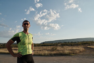 Image showing triathlon athlete running on morning trainig