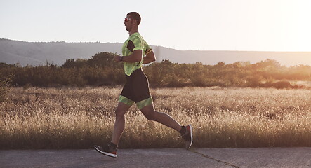 Image showing triathlon athlete running on morning trainig